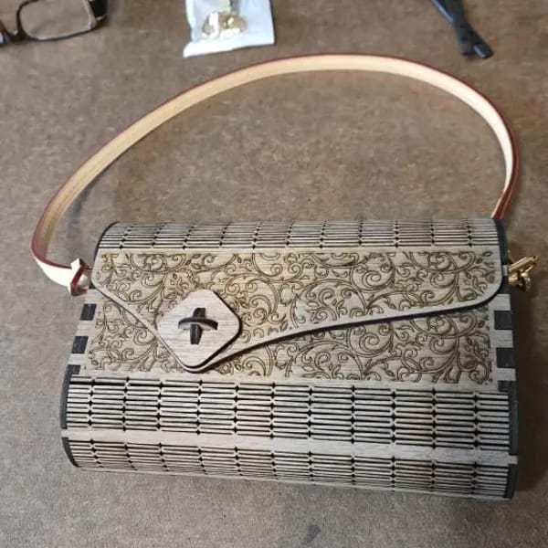 Customer photo review of Wooden clutch handbag purse laser cut svg file