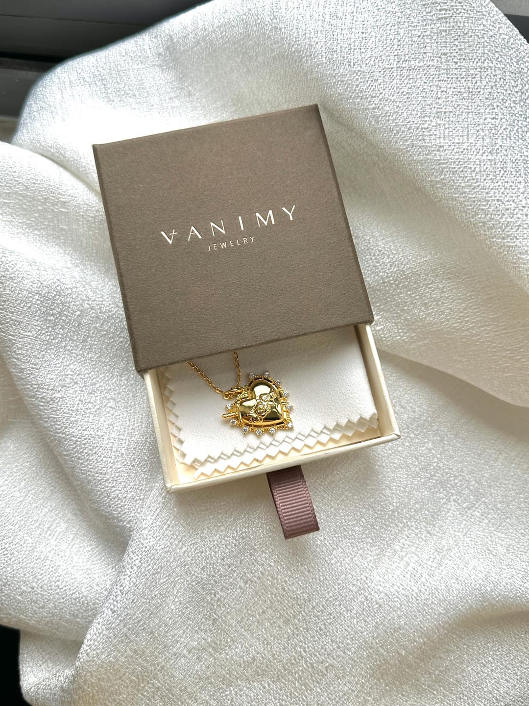 Customer photo review of Sacred Heart Rose Necklace