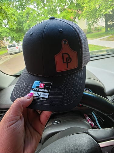 Customer photo review of Ear Tag Custom Leather Patch Trucker Hat - Richardson 112