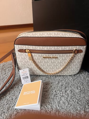 Customer photo review of Jet Set Large Logo Crossbody Bag (VANILLA)