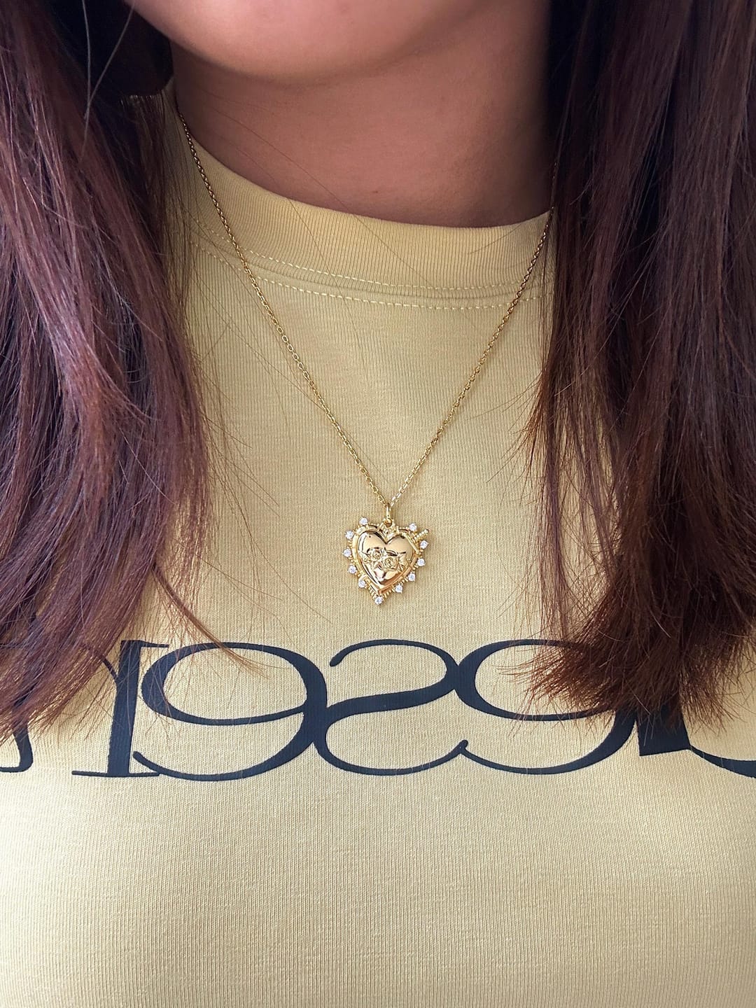 Customer photo review of Sacred Heart Rose Necklace
