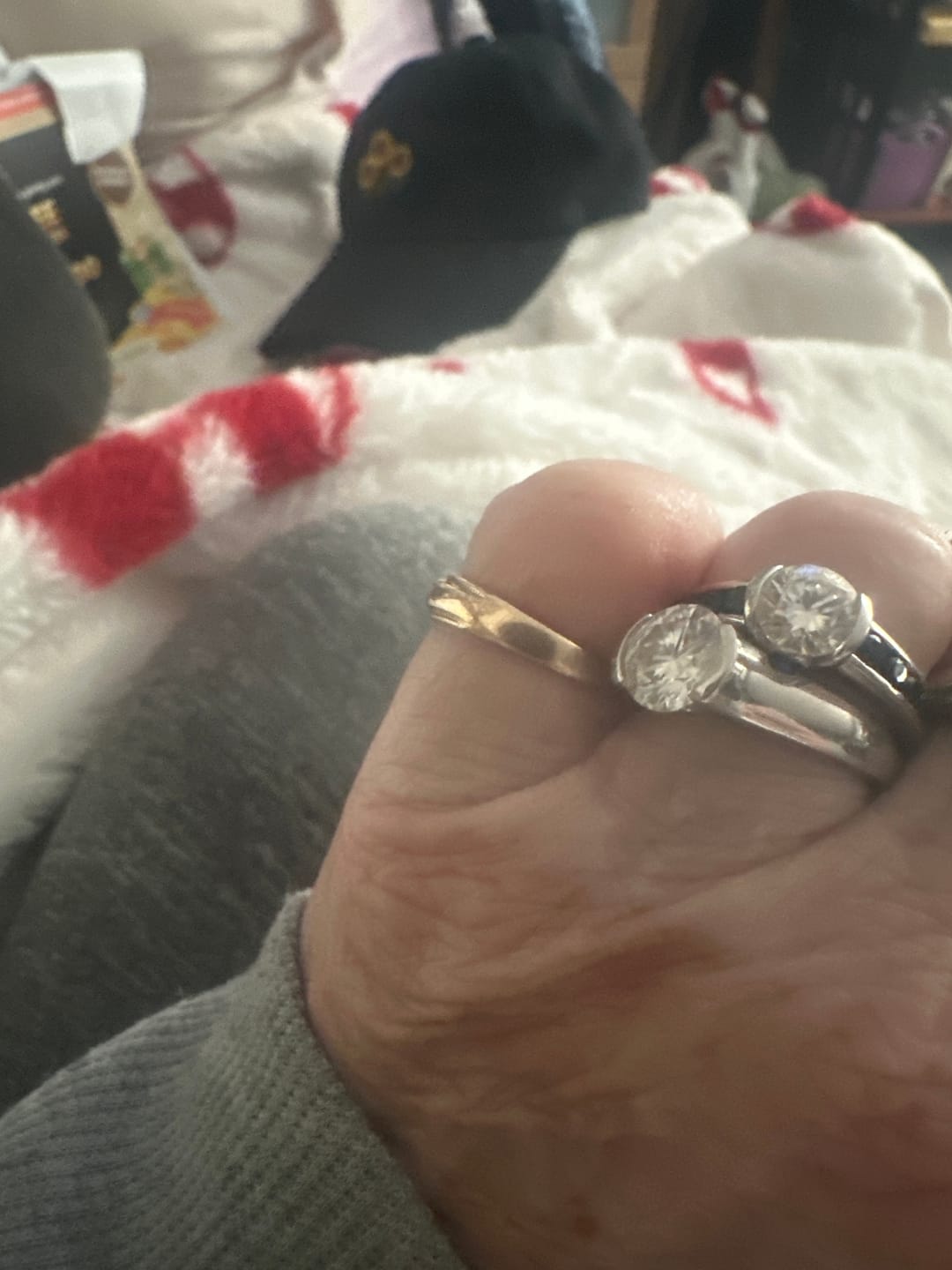 Customer photo review of Half Bezel Moissanite With Sapphire Channel Set Engagement Ring