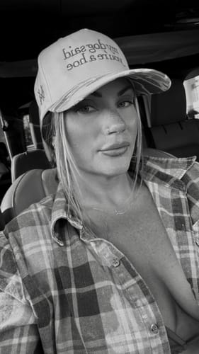 Customer photo review of MHC My Dog Said You're a Hoe Trucker Hat