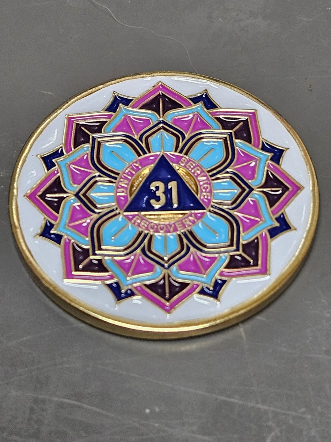 Customer photo review of 31 Year Sobriety Mint 'In Bloom' Lotus Flower Gold Plated AA Recovery Medallion - Thirty-One Year Chip/Coin - White
