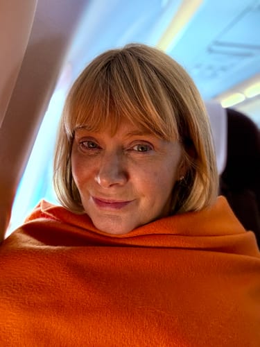 Customer photo review of Scottish Begg & Co Tangerine Orange Luxury Woven Cashmere Wrap