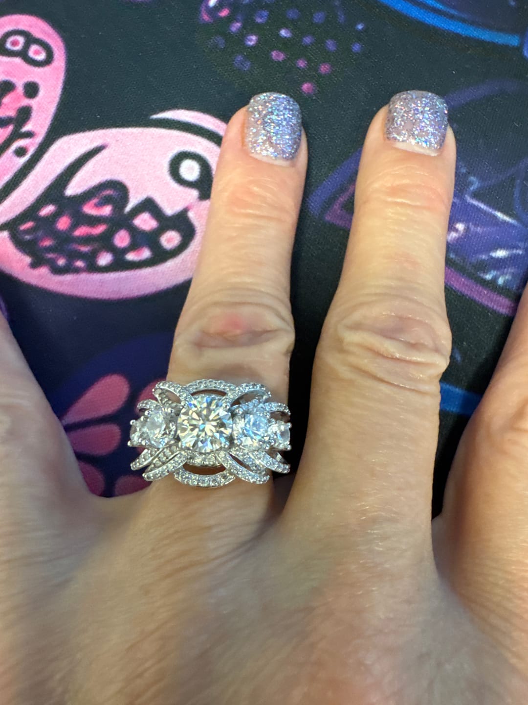 Customer photo review of Five Stone Round Moissanite Multi-Row Crossover Pave Engagement Ring