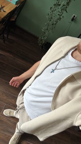 Customer photo review of BLUE CROSS PENDANT.