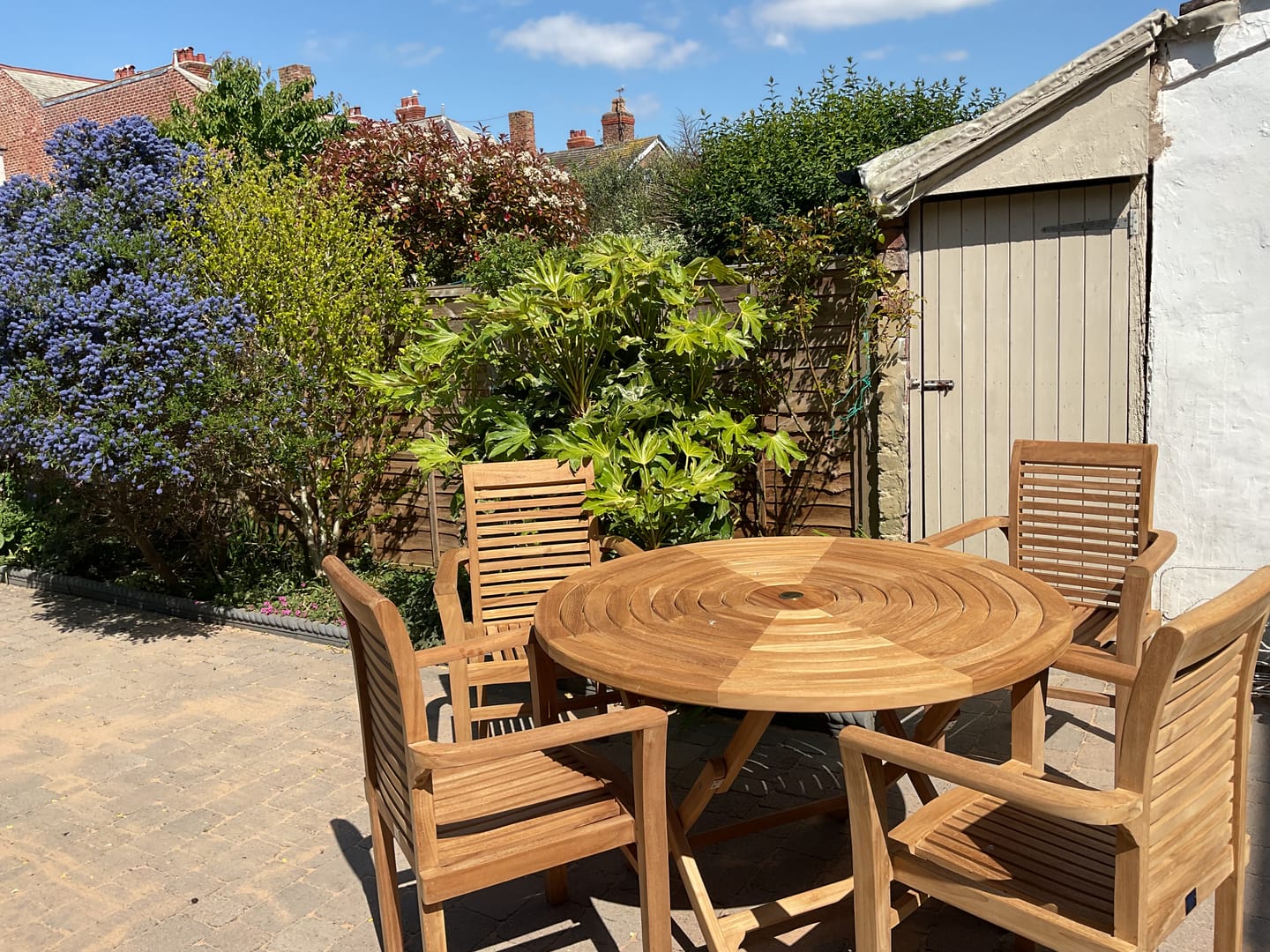 Customer photo review of 4 x Oxford Teak Stacking Chair and Cushion.