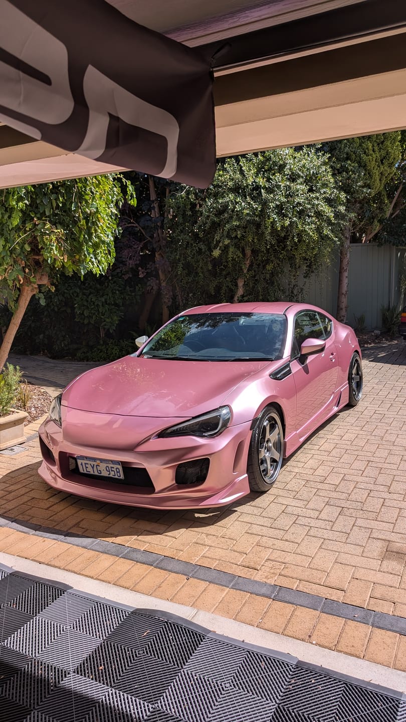Customer photo review of Glossy Metallic Passion Pink Vinyl Wrap