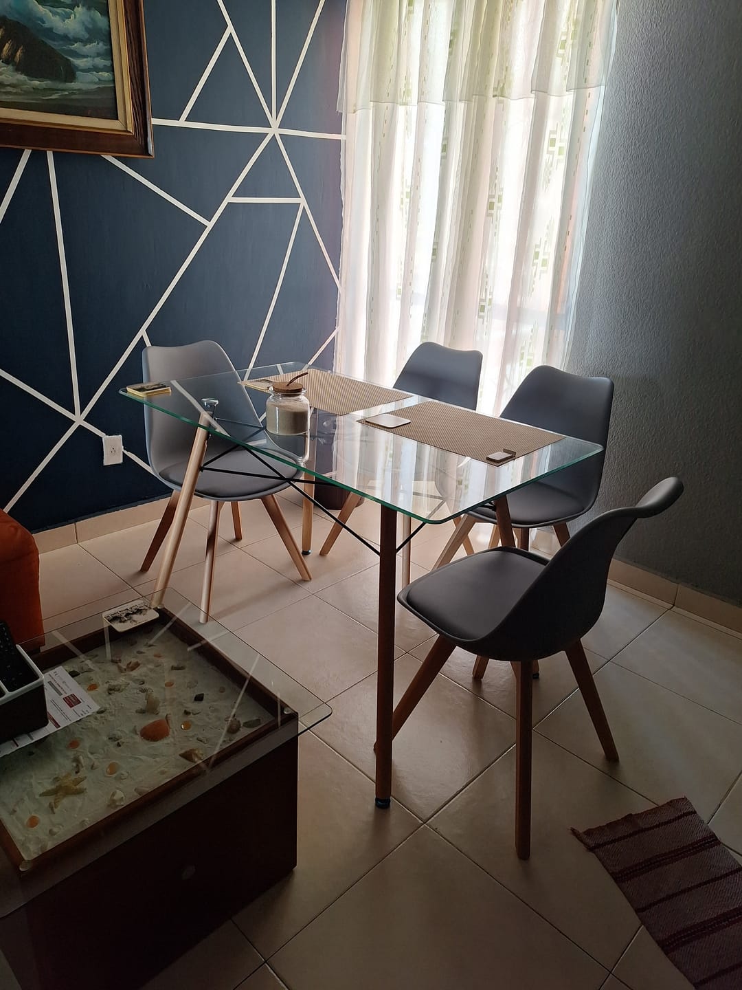 Customer photo review of Comedor Mesa Oslo Cristal T5  + 4 Sillas Frankfurt