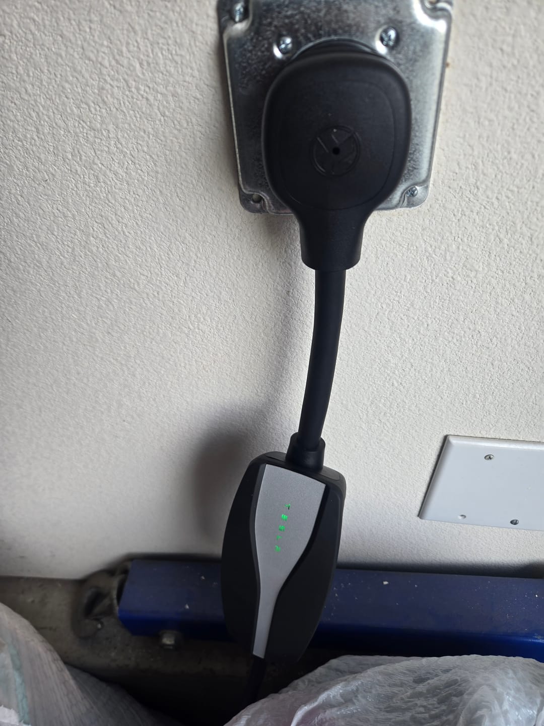 Customer photo review of Tesla Mobile Charger -Tesla Gen 2 Mobile Connector EV Charger UMC charging with 220-Volt and 110-Volt adapters.