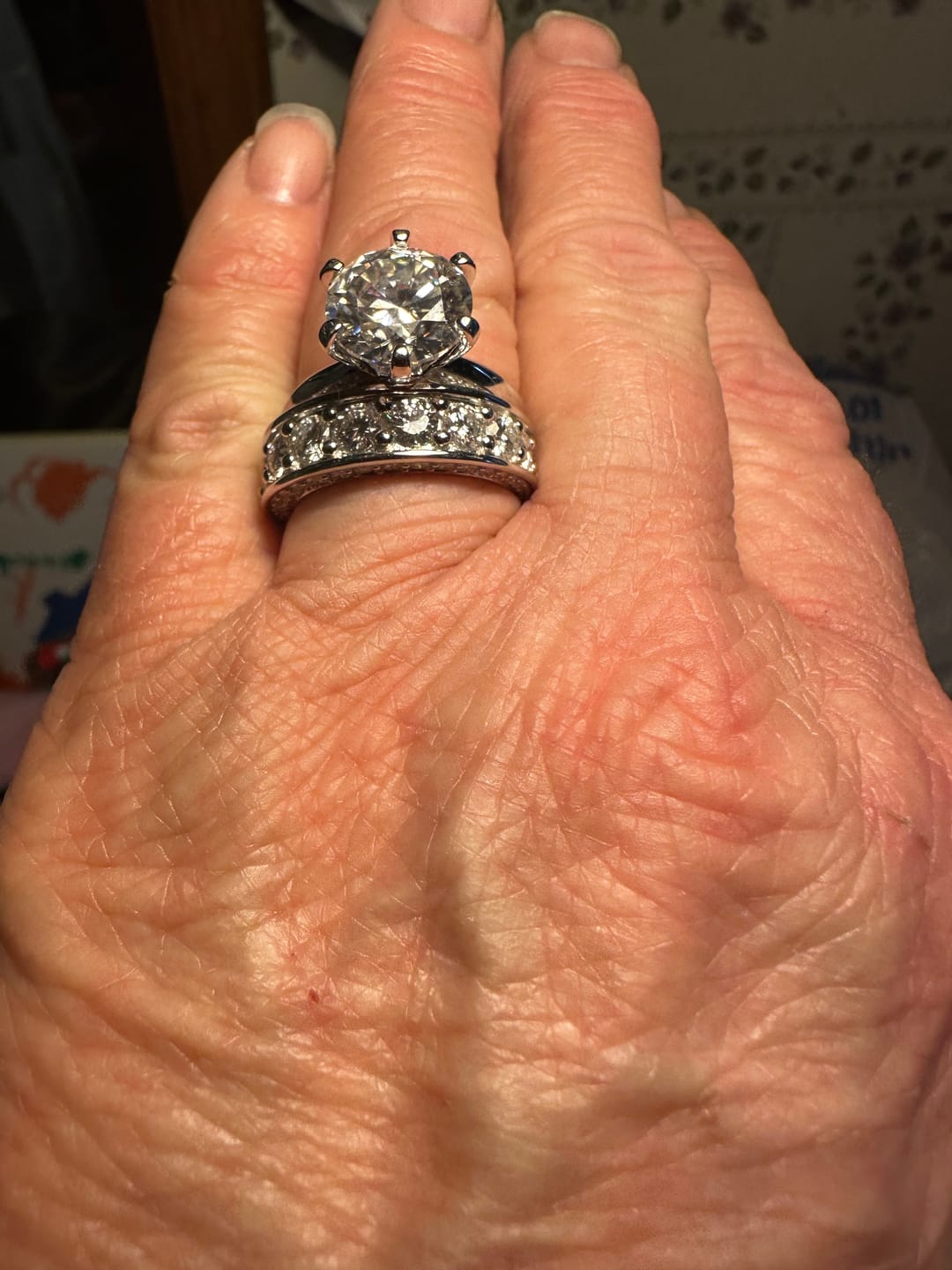 Customer photo review of Classic Solitaire Moissanite Six-Prong Sterling Silver Engagement Ring