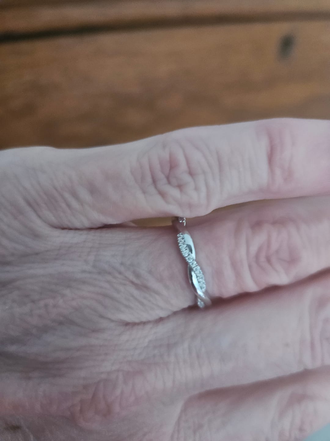 Customer photo review of Twisted Vine Moissanite Half Eternity Wedding Band Stackable Ring
