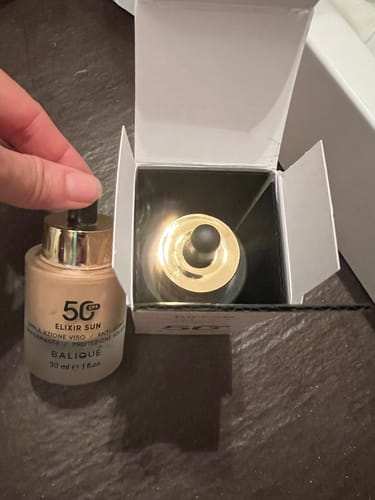 Customer photo review of ELIXIR SUN SPF50 - Siero Viso tripla azione