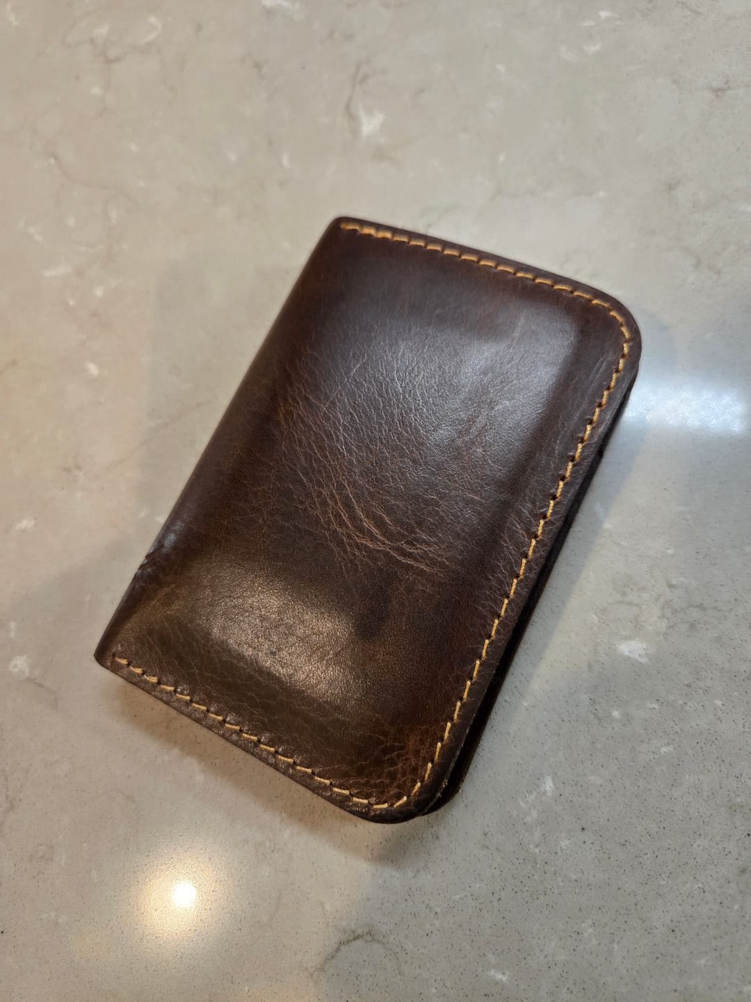 Customer photo review of The Tyler Vertical Wallet