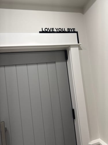 Customer photo review of Love You Bye Door Frame Sign