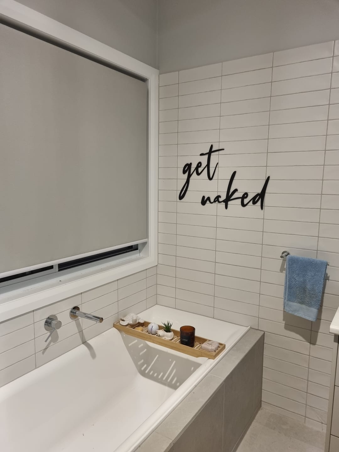 Customer photo review of Get Naked Metal Sign