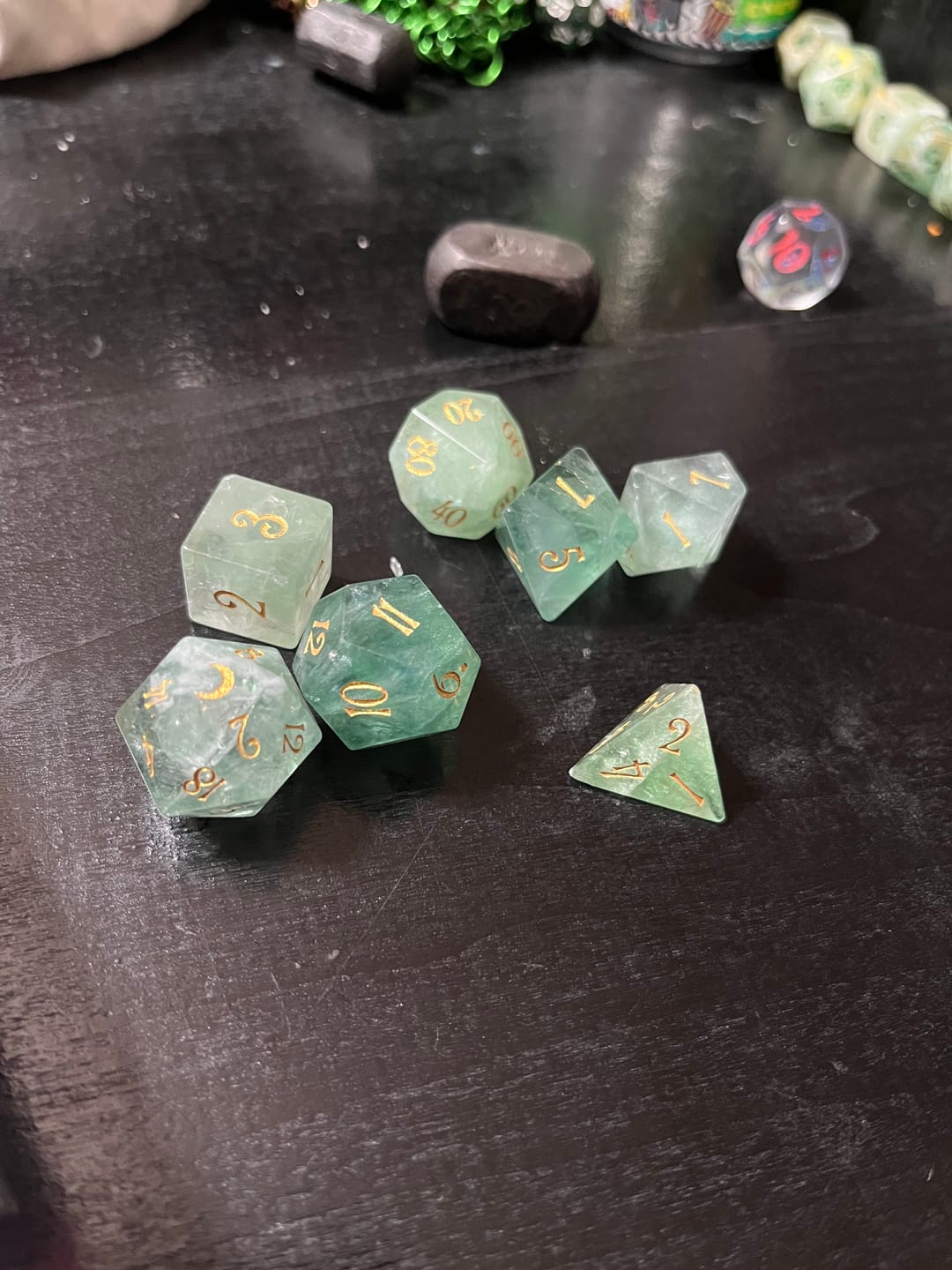 Customer photo review of URWizards D&D Green Fluorite Gemstone Engraved Dice Set Moon Style