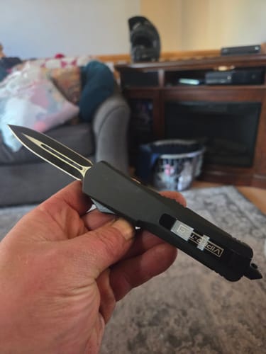 Customer photo review of Black Ghost OTF Knife (Multiple Blade Styles Available)
