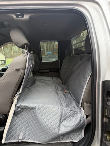 Customer photo review of NEW Waterproof Hard Bottom Car & Truck Seat Foldable Hammock Cover With Storage Pockets, Side Flaps, Headrest Straps, Seat Anchors, & Mesh Window (+FREE SAFETY BELT!)