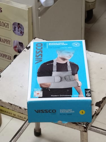 Customer photo review of Shoulder Immobilizer | Provides Firm Support for Shoulder Dislocation & Relieves Pain (Grey)