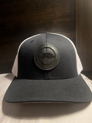 Customer photo review of Custom Leather Patch Trucker Hat - Flexfit 6511