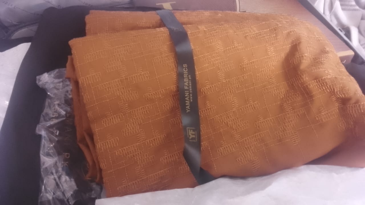 Customer photo review of Gents Unstitched wash n wear Embroidery Suit (nova crown) mustard box
