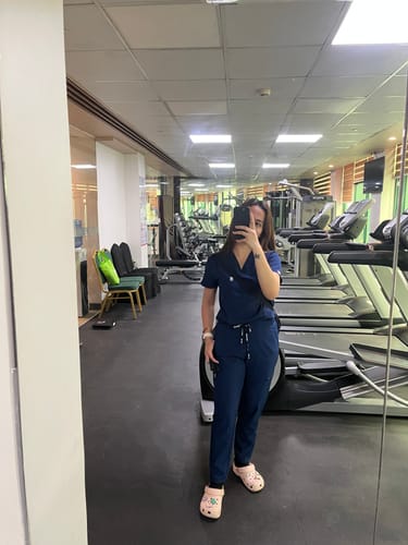 Customer photo review of 5-Pocket MoveTech® Scrub Top - Women / Navy
