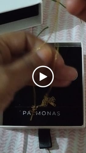 Customer video review of Golden Cross Necklace