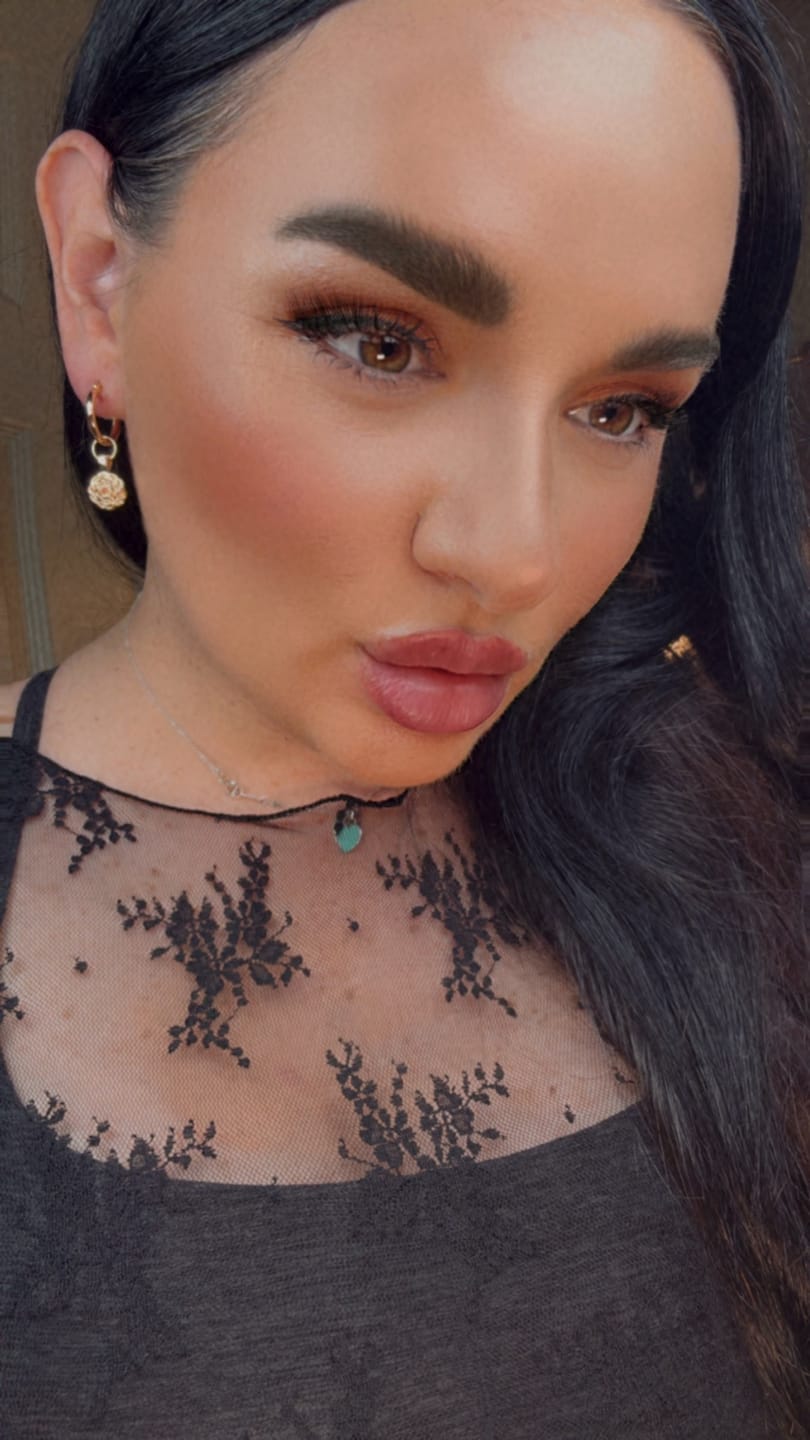Customer photo review of Elsa Carnation Garnet Earrings