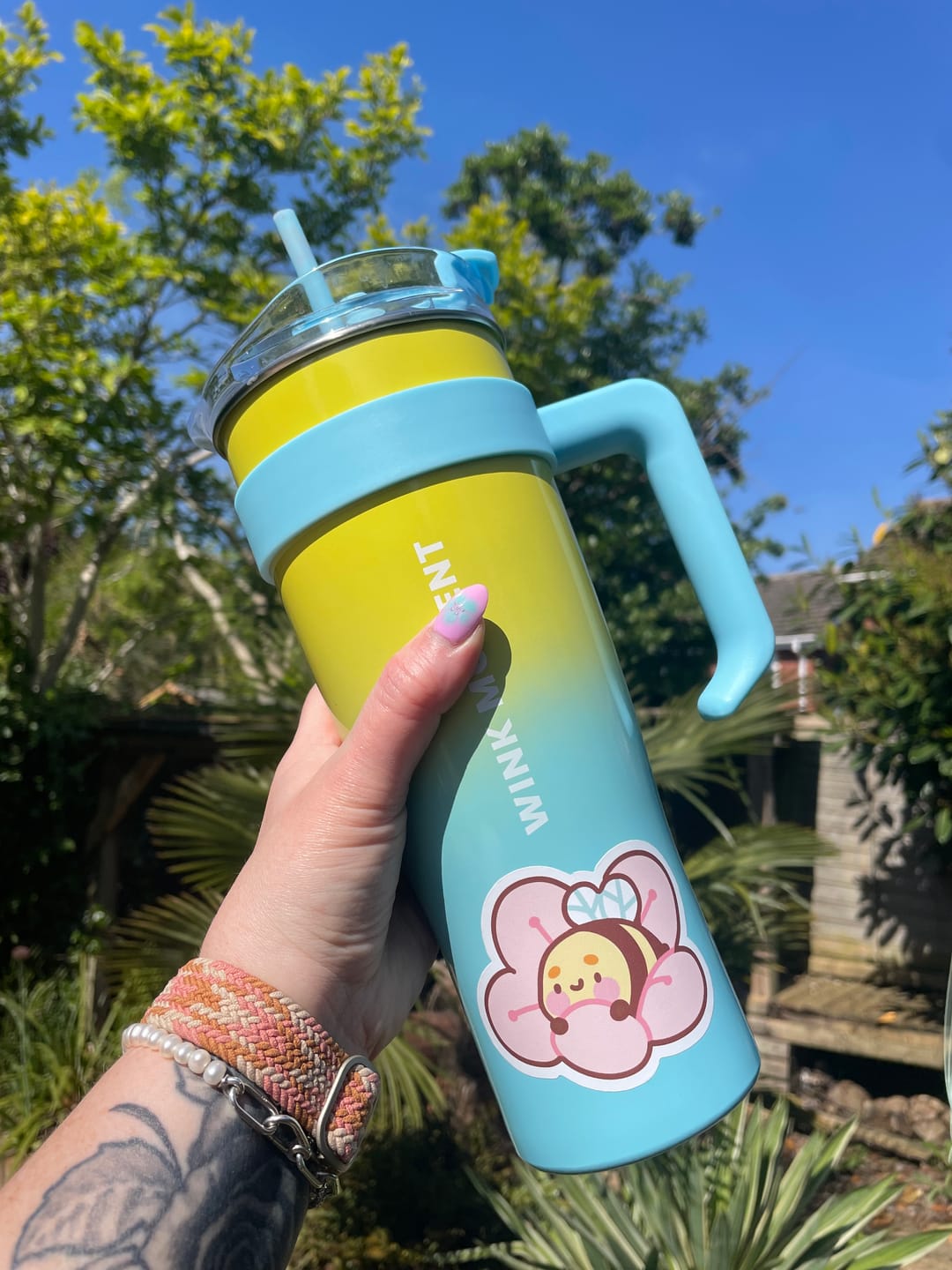 Customer photo review of Bumblebutt Sakura Flower Die-Cut Vinyl Sticker | Cute Kawaii Decor