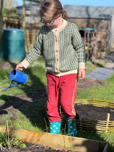 Customer photo review of From One To Another Olive Striped Knitted Cardigan