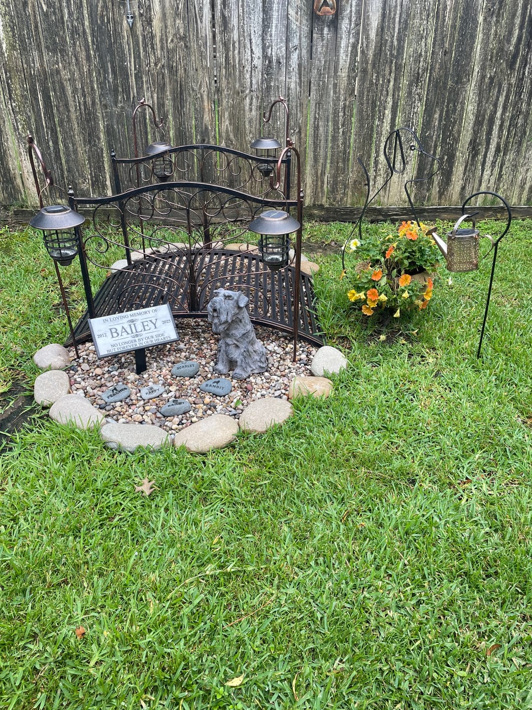 Customer photo review of Dog headstones Grave Marker Custom Engraved Pet Memorial River Rock Stone Heart Paw Print