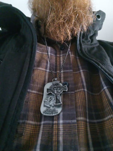 Customer photo review of INRI Cross - Victory Over Sin & Death Necklace: Helps Pair Veterans With A Service Dog Or Shelter Dog.
