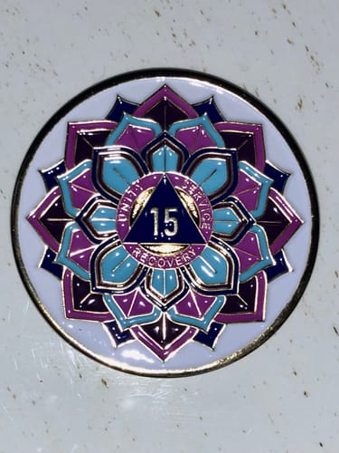 Customer photo review of 15 Year Sobriety Mint 'In Bloom' Lotus Flower Gold Plated AA Recovery Medallion - Fifteen Year Chip/Coin - White