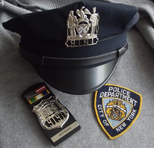Customer photo review of NY New York Police Officer Badge/Cap Badge Replica Movie Props No. 9191