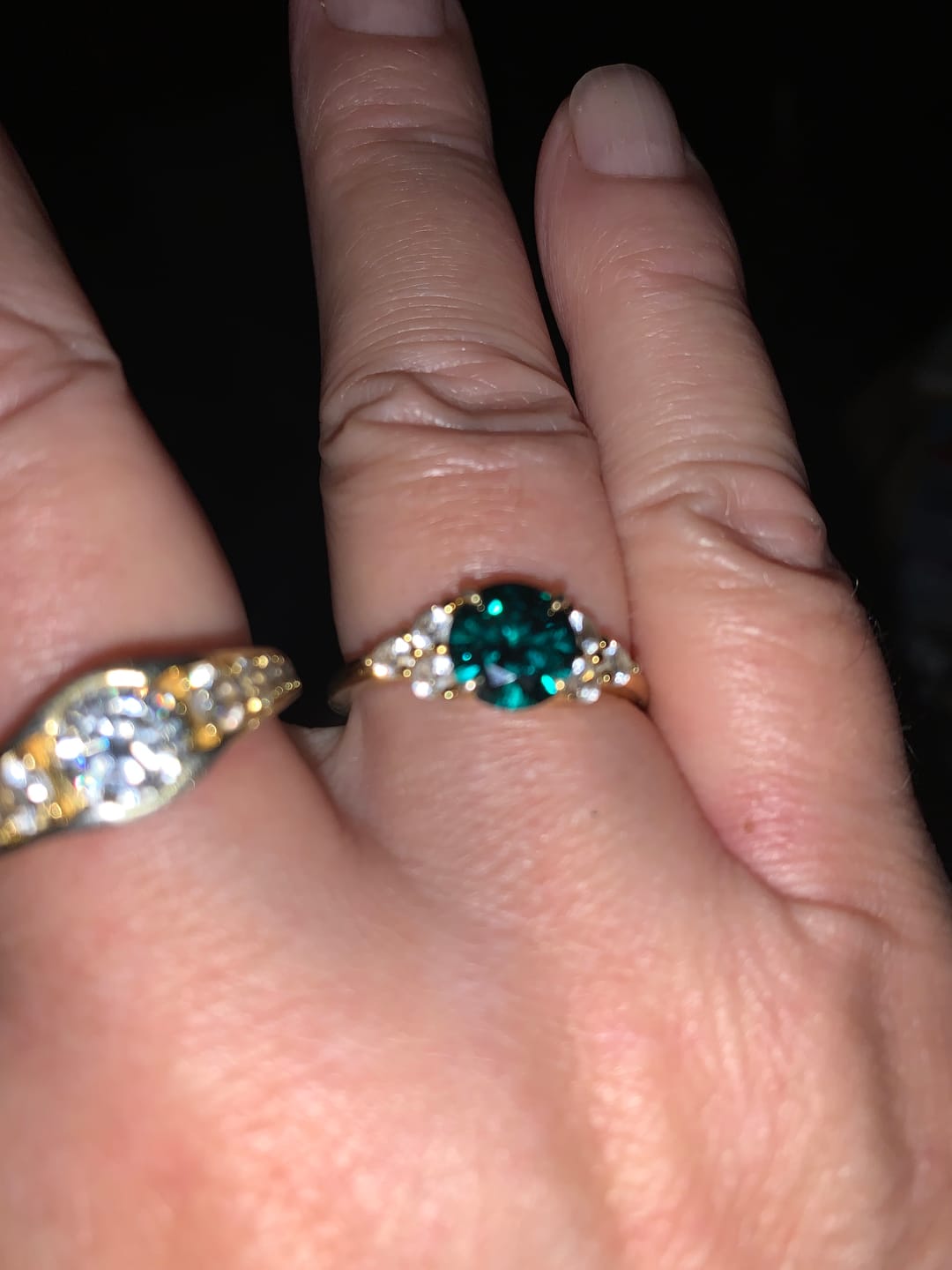 Customer photo review of Green Moissanite Side Stone Engagement Ring