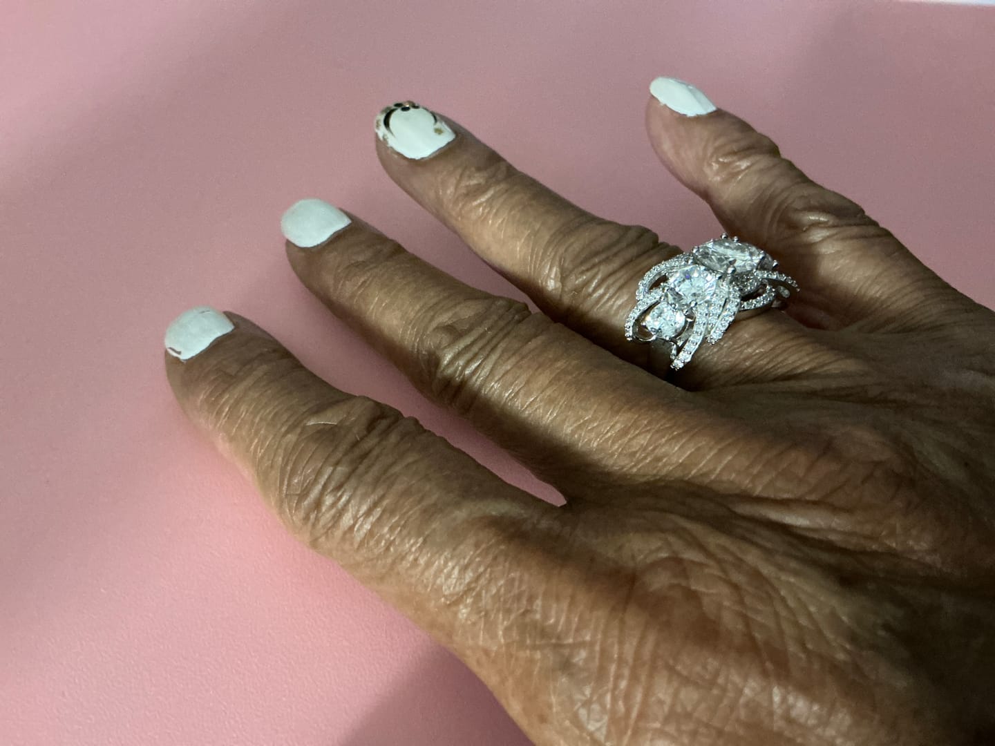 Customer photo review of Five Stone Round Moissanite Multi-Row Crossover Pave Engagement Ring