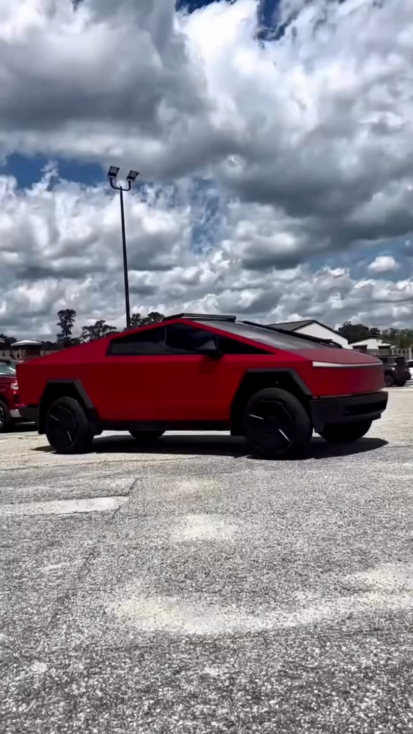 Customer photo review of Satin Chrome Prismatic Red Vinyl Wrap