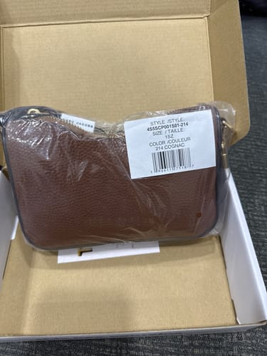 Customer photo review of Marc Jacobs Drifter Wristlet In Cognac 4S5SCP001S01