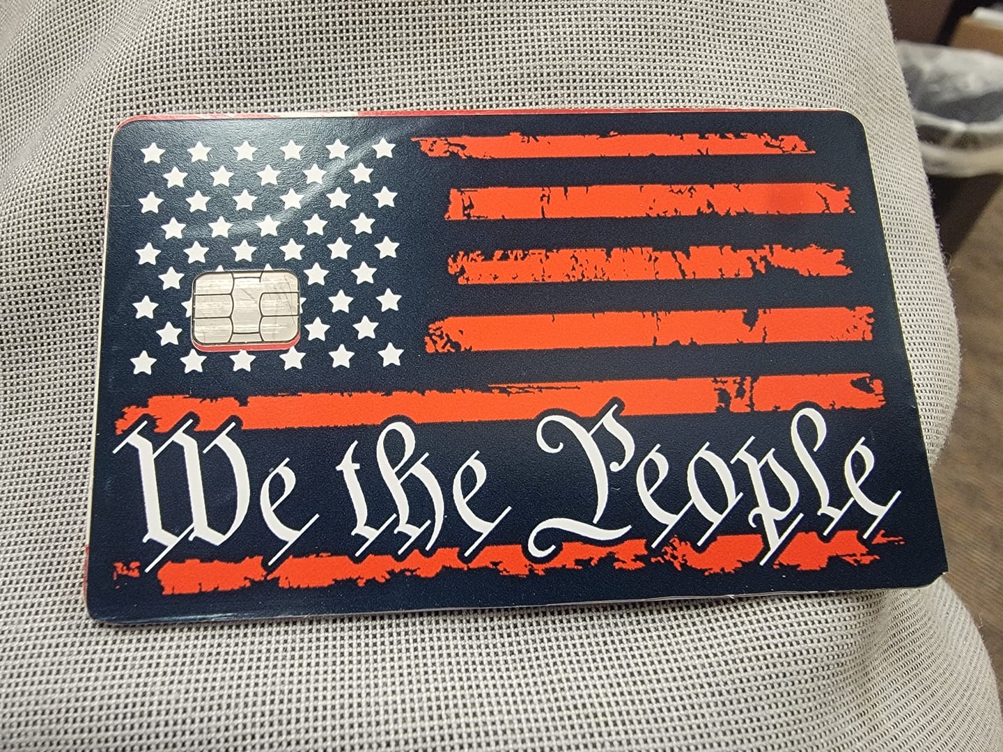 Customer photo review of We The People Flag Credit Card Skin Decal