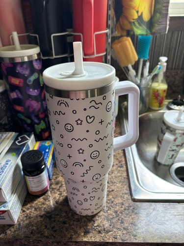 Customer photo review of SMILEY FLOWERS 3 Spill Proof Adult CREWCUP 40oz