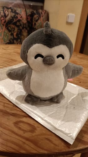 Customer photo review of Penguin Adoption Plushie
