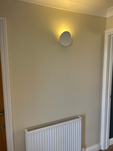 Customer photo review of Modern Round Wall Sconce with Solar Shape