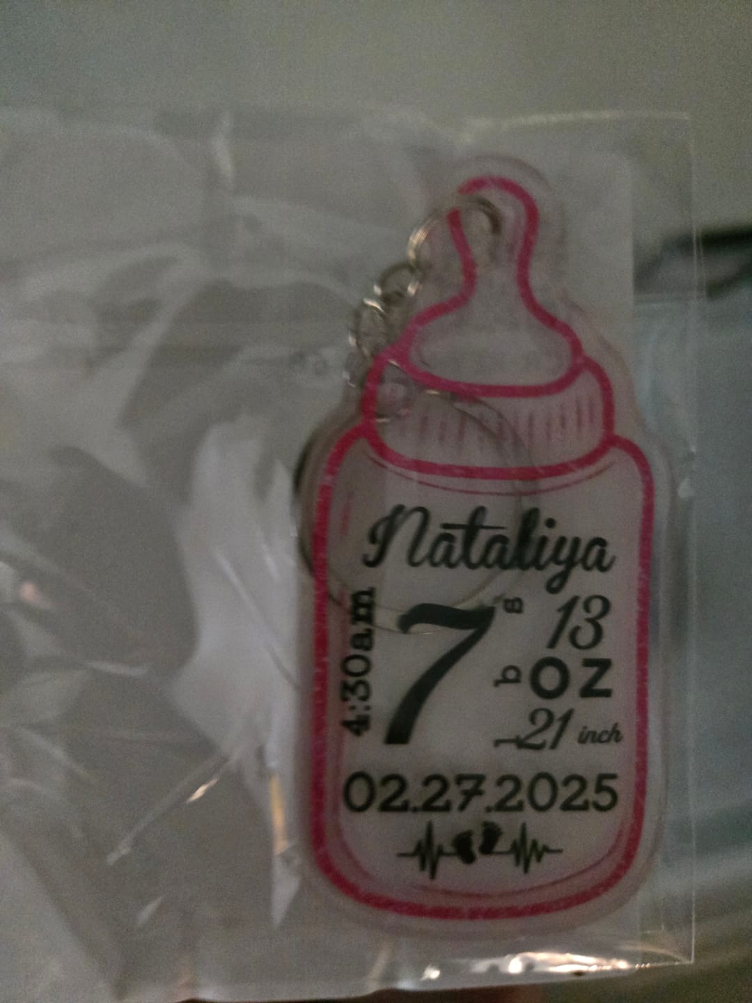 Customer photo review of Custom Baby Bottle Acrylic Keychain for New Parents - Personalized New Baby Feeding Bottle Acrylic Keychain