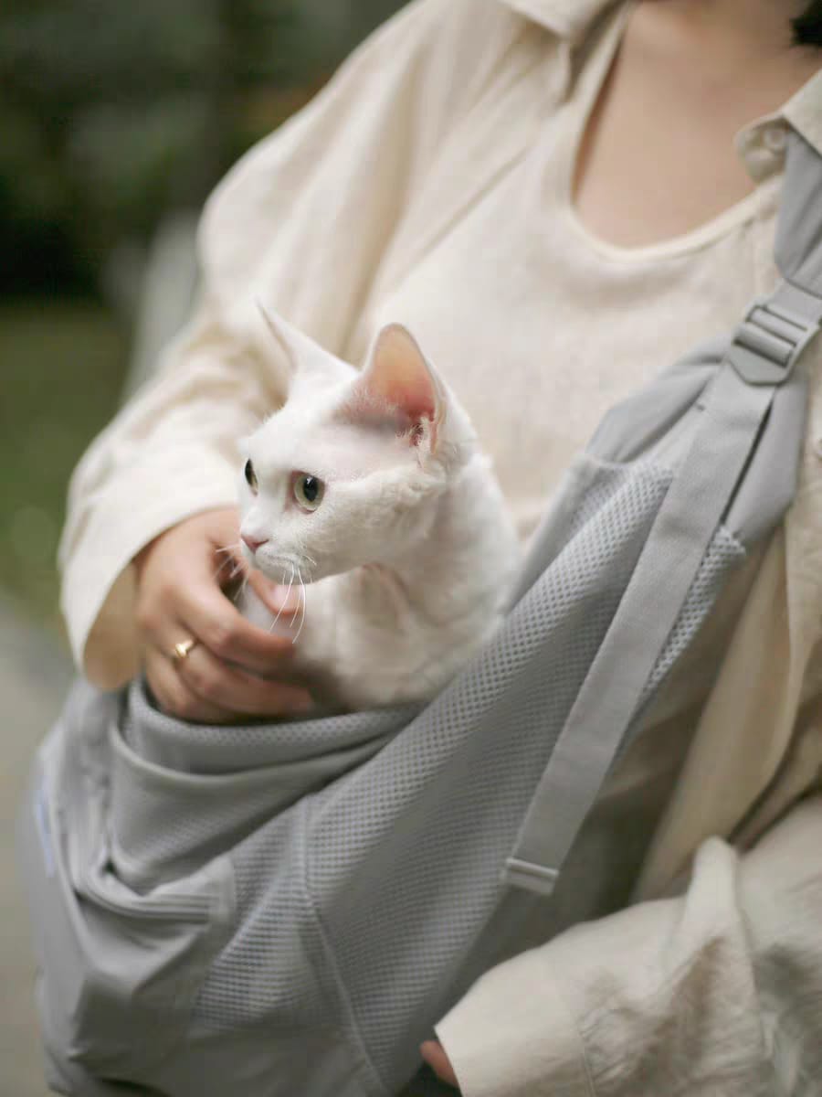 Customer photo review of Breathable Summer Pet Sling Carrier Bag With Pocket