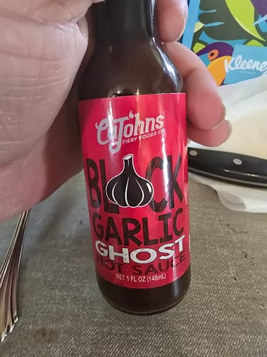 Customer photo review of CaJohns Black Garlic Ghost Pepper Hot Sauce