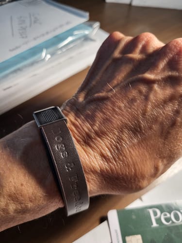 Customer photo review of Dogs & Freedom Leather Bracelet: Helps Pair Veterans With A Service Dog Or Shelter Dog