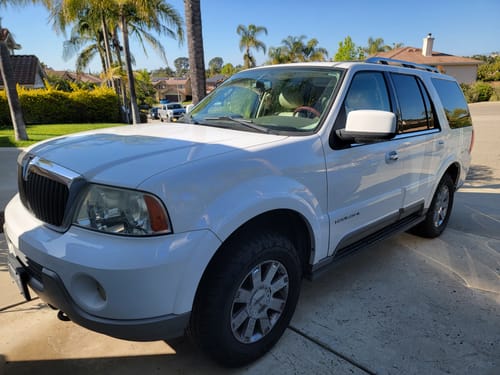 Customer photo review of 2003-2004 Lincoln Navigator 4 Wheel Air Suspension Conversion And Lift Kit with Suspension Light Out Module and Camber Bolt Kit (FX24FMCKL)