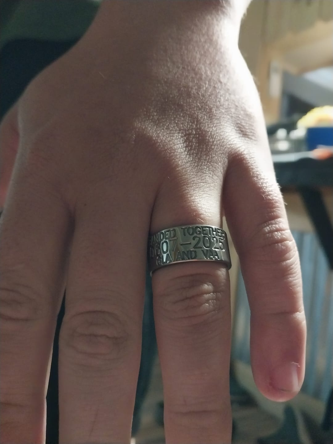 Customer photo review of Duck Band Wedding Ring - 10mm Titanium